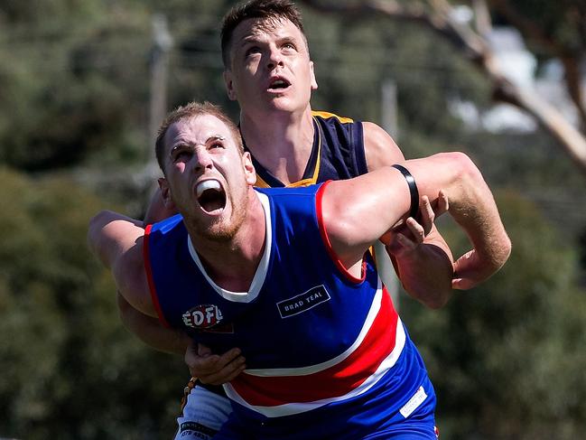 Hamish McIntosh of Strathmore contests a boundary throw in with Andrew Browne of Keilor during the EDFL match between Keilor and Strathmore played in Keilor on Firday 25th March, 2016. Picture: Mark Dadswell