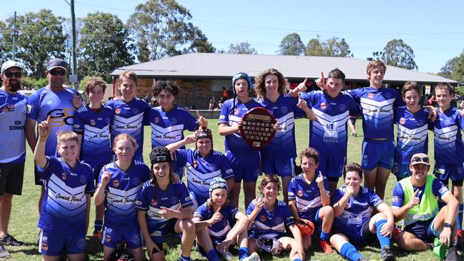 Grafton Ghosts under-13 celebrate a Group 1 Junior Rugby League grand final victory after a 32-22 win over the Ballina Seagulls. Photo: Amy Hodge