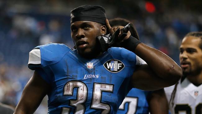 Joique Bell celebrates with fans.