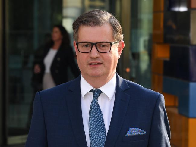 Andrew Hagger, Chief Customer Officer of the National Australia Bank leaves the Federal Court, Melbourne, Monday, April 23, 2018. The financial services royal commission public hearing into financial advice continues in Melbourne. (AAP Image/James Ross) NO ARCHIVING