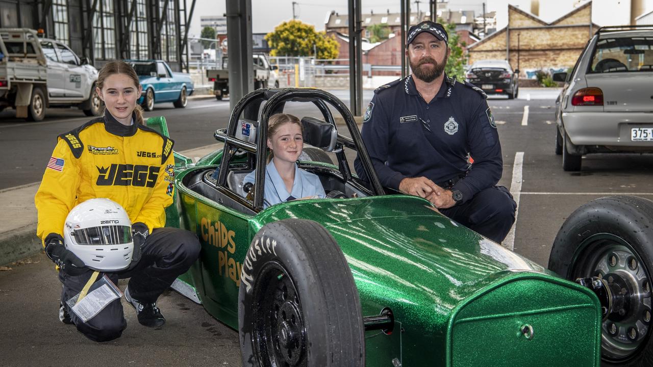 GREEN MACHINE: Sisters, Emily (left) and Kylie Gray said driver safety always came first, a message supported by Toowoomba's Road Policing Unit Senior Constable Duncan Miller. Picture: Nev Madsen