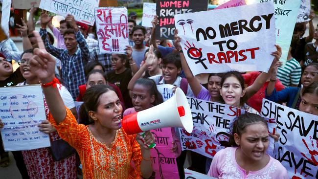 Banaras Hindu University students hold posters and shout slogans during a march against the attack. Picture: Niharika Kulkarni/AFP