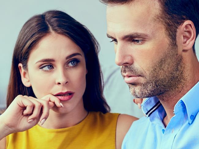 A couple who are stressed about money working out their finances together and assessing their credit card debt. Picture: iStock.