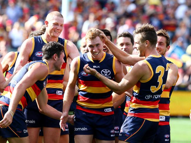 Tom Lynch being congratulated after winning the Showdown Medal. Picture: Sarah Reed