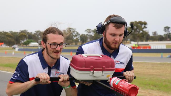 All hands on deck. The UOW Motorsport crew hard at work. Photo: Contributed