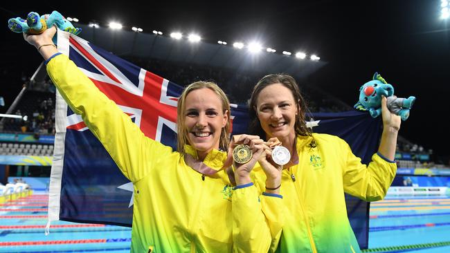 Bronte Campbell and sister Cate after the 100m Freestyle Final. Picture: AAP Image/Dave Hunt