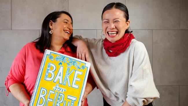 Rose Adam and Poh Ling Yeow with the cover of Rose's cookbook. Picture: Matt Turner.