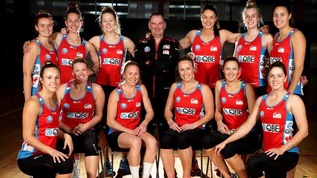 The NSW Swifts with coach Rob Wright who has signed a new contract with the club.