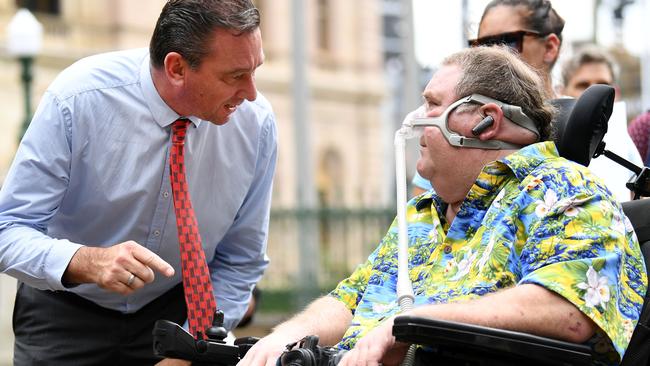 Queensland Minister for Seniors and Disability Services Craig Crawford (left) talks to disability advocate Matt McCracken. Picture: NCA NewsWire / Dan Peled