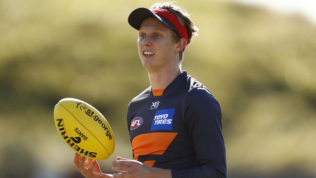 Lachie Whitfield has to prove his fitness to face Collingwood on Saturday.