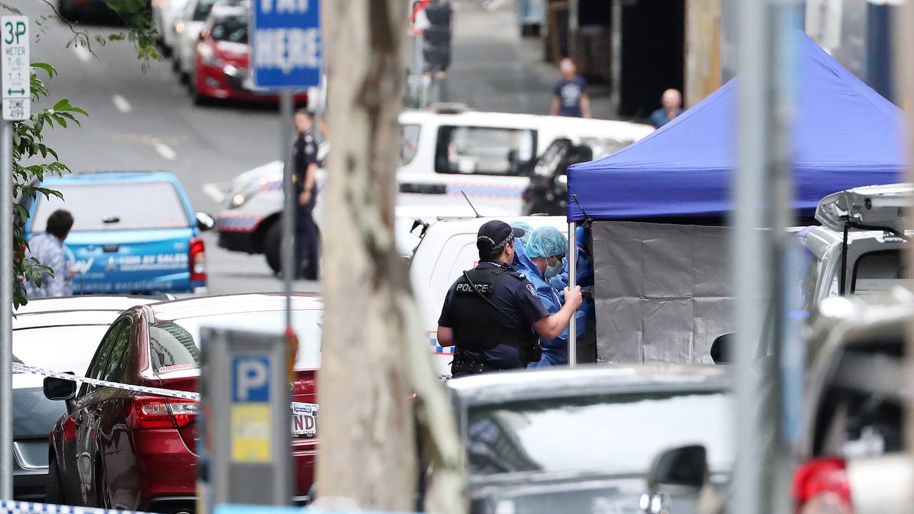 Forensic police at the shooting on Mary Street in front of the Westin hotel, Brisbane. Photographer: Liam Kidston.