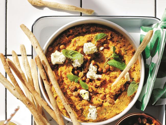 Roasted carrot hummus with feta and mint and ginger, lime, honey spritz from Delicious.