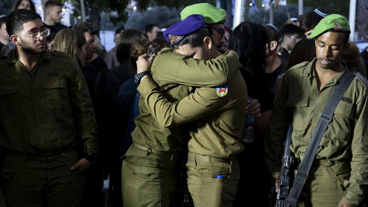 Soldiers mourn during a funeral for IDF soldier Sergeant Michael Ruzal, who was killed in a rocket attack in Southern Israel. Picture: Amir Levy/Getty Images