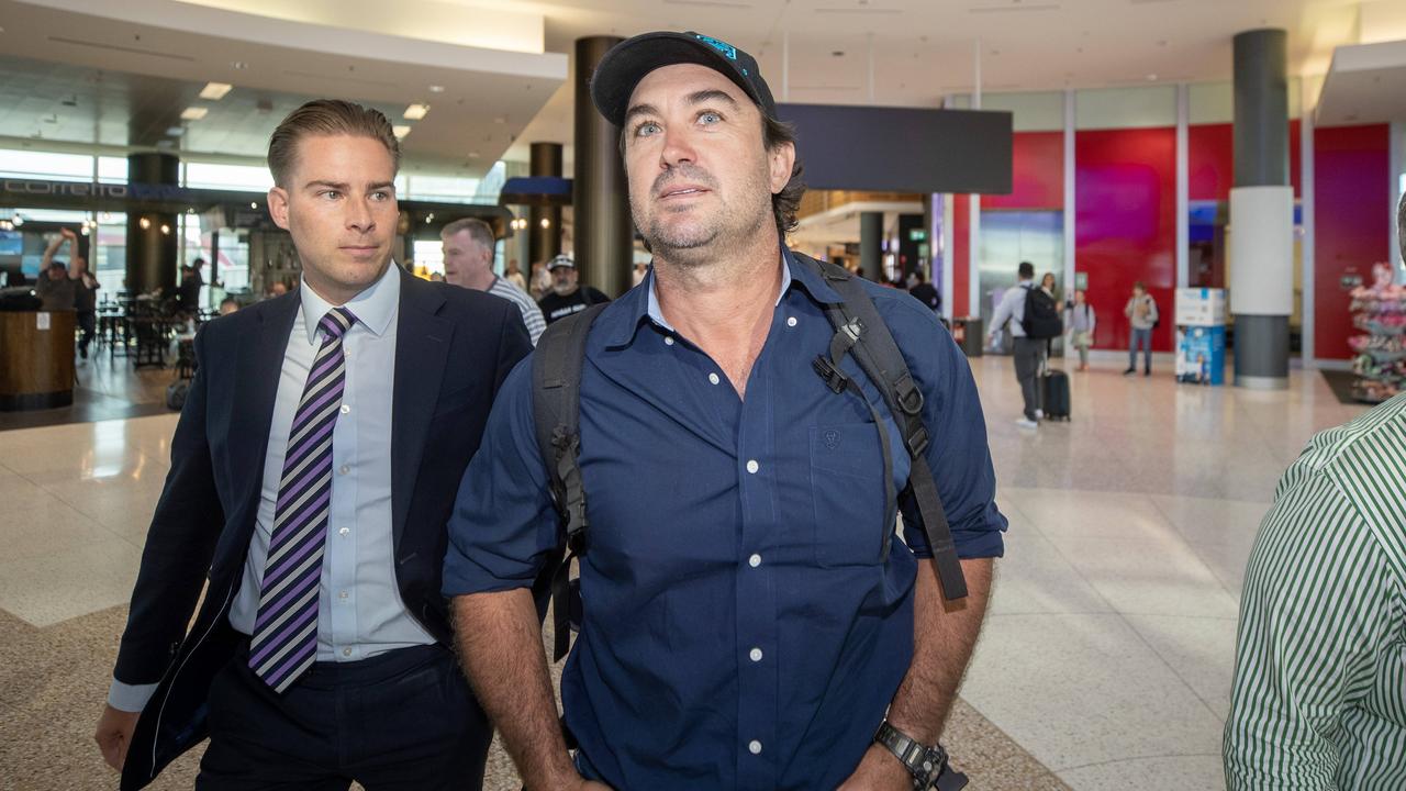 Outback Wrangler Matt Wright walks to his flight at Sydney Airport. Picture: Liam Mendes / The Australian