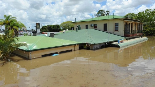 The Melbourne Hotel in floodwaters, 2013. A historic building submerged by the devastating event. Photo: Mike Knott, NewsMail