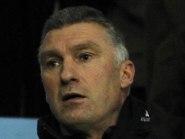 Leicester City's English manager Nigel Pearson looks on from his position in the stands ahead of the English Premier League football match between Aston Villa and Leicester City at Villa Park in Birmingham, central England on December 7, 2014. AFP PHOTO/IAN KINGTON RESTRICTED TO EDITORIAL USE. No use with unauthorized audio, video, data, fixture lists, club/league logos or "live" services. Online in-match use limited to 45 images, no video emulation. No use in betting, games or single club/league/player publications.