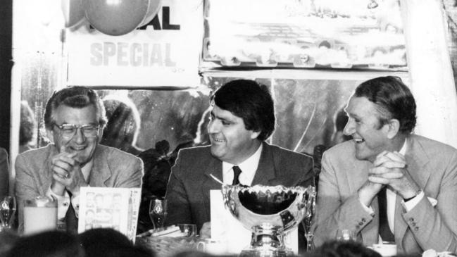 Bob Hawke and Malcolm Fraser with Albert Mantello (centre) at the North Melbourne Grand Final Breakfast in 1982.