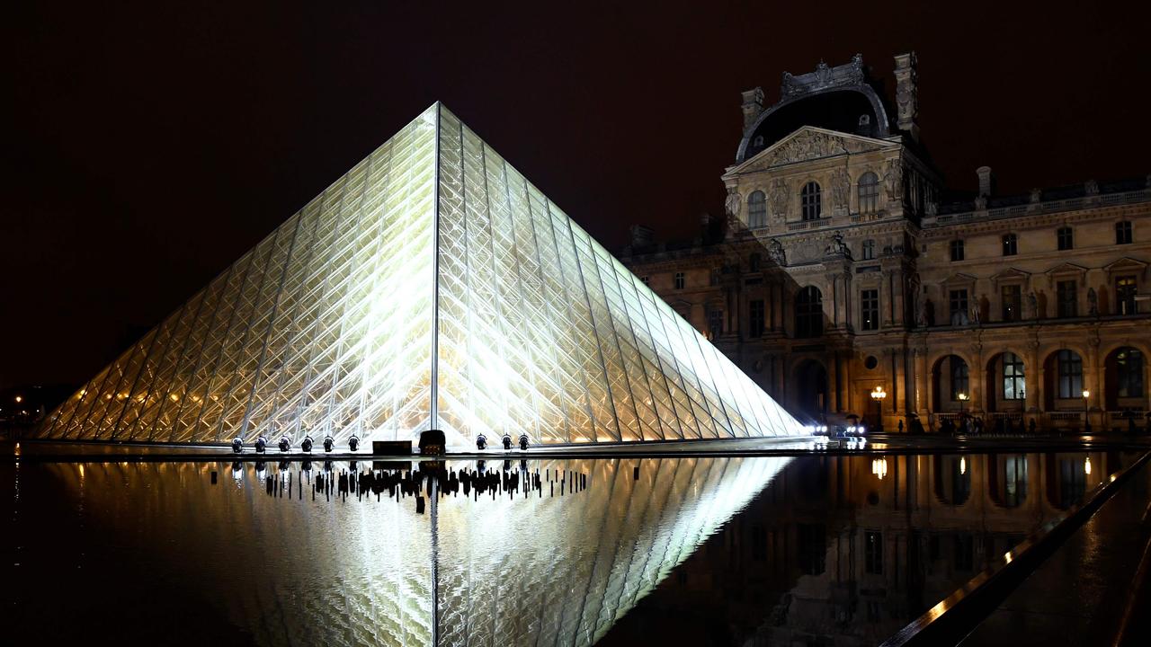 The show was staged at the Louvre Pyramid. Picture: AFP
