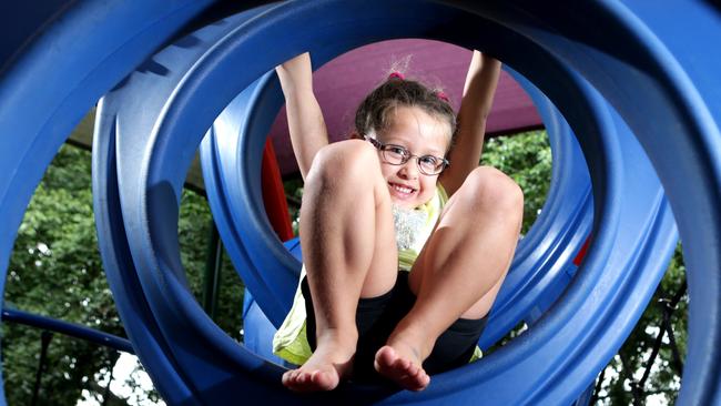 Taylor Hughes, 4, loves to play at the playground. Pic Tim Marsden