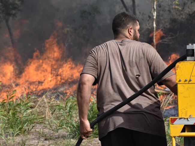 Queensland Fire and Emergency Services, are working on containing a vegetation fire near Tiaro. Generic QFES, RFS, firefighter. Picture: Zizi Averill