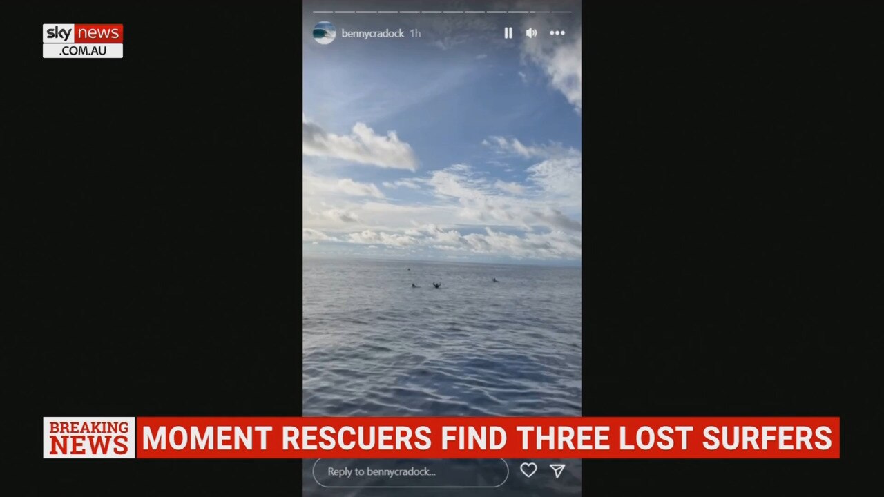 Footage from rescuers show dramatic moment three missing surfers were found