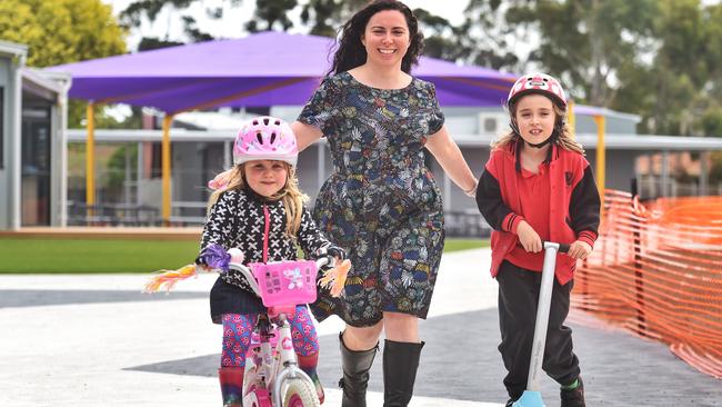 Alice Pryor accompanies her children Annabel, 3, and Charlie, 7, on an active trip to school. Picture: Tony Gough