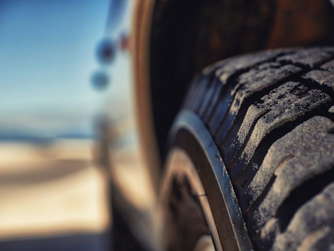 4WD BEACH STOCK -  Shot of a heavy duty 4x4 driving along some sand dunes Picture: Istock