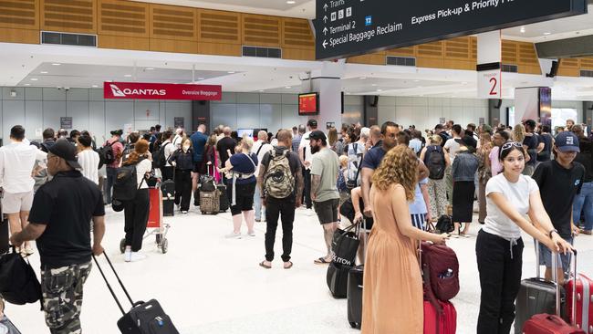 Arrivals at Sydney Airport. Picture: Monique Harmer