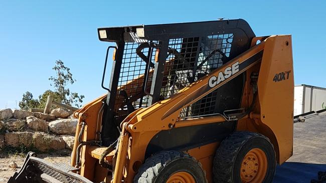 A man suffered a knee injury after getting trapped between a bobcat and another vehicle at Yabulu. Picture: FILE