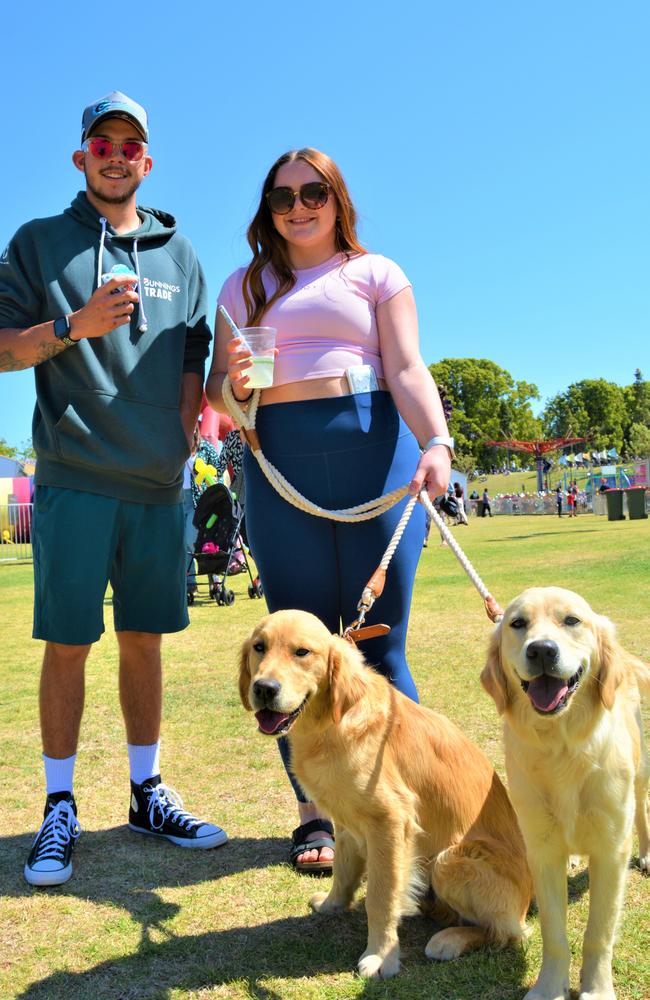 At the 2023 Grand Central Floral Parade are (from left) Jack Wheatley and Taylor Jones with their dogs (from left) Pluto and Poppy. Picture: Rhylea Millar