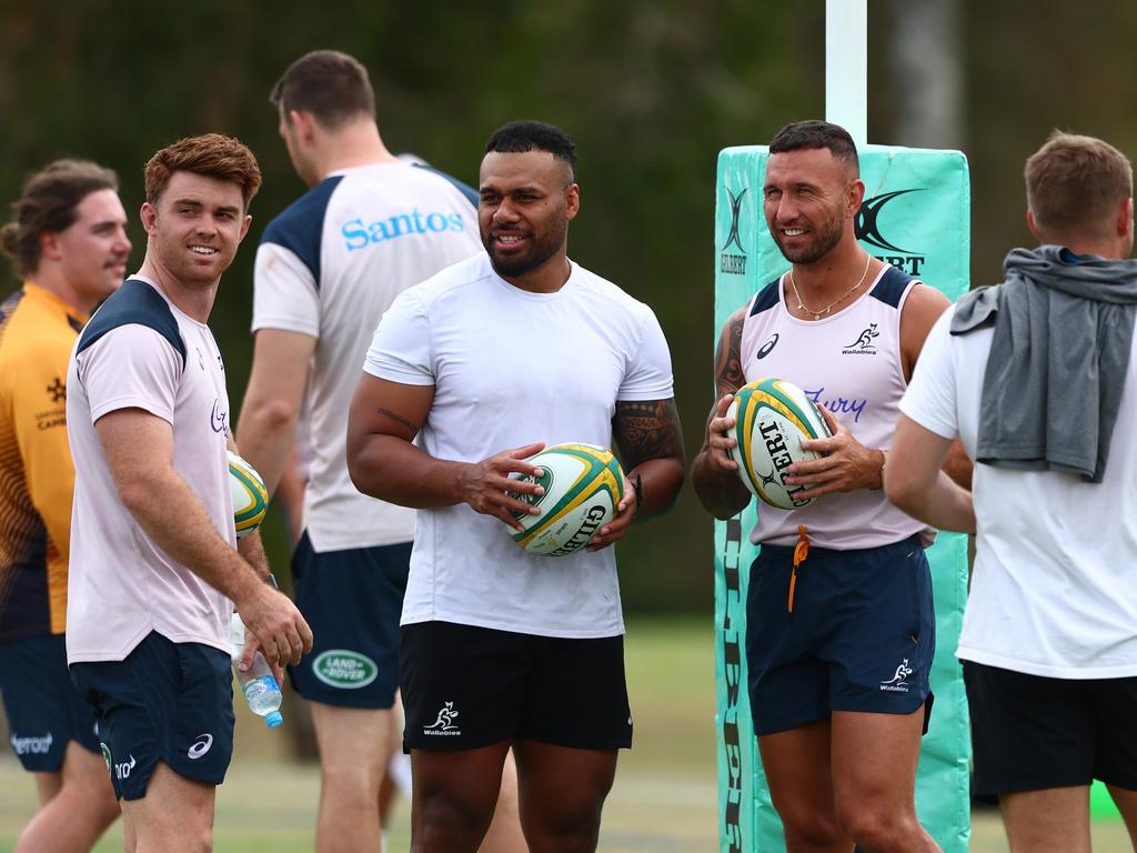 Samu Kerevi (centre) and Quade Cooper (right) are a step closer to reforming their Wallabies midfield partnership. Picture: Chris Hyde/Getty Images