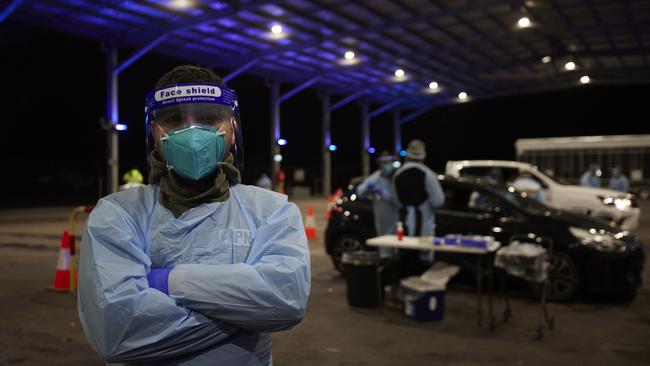 Medical officer Ahmed poses for a photo at the Fairfield Showgrounds COVID-19 testing clinic on Saturday. Photo: Brook Mitchell/Getty Images