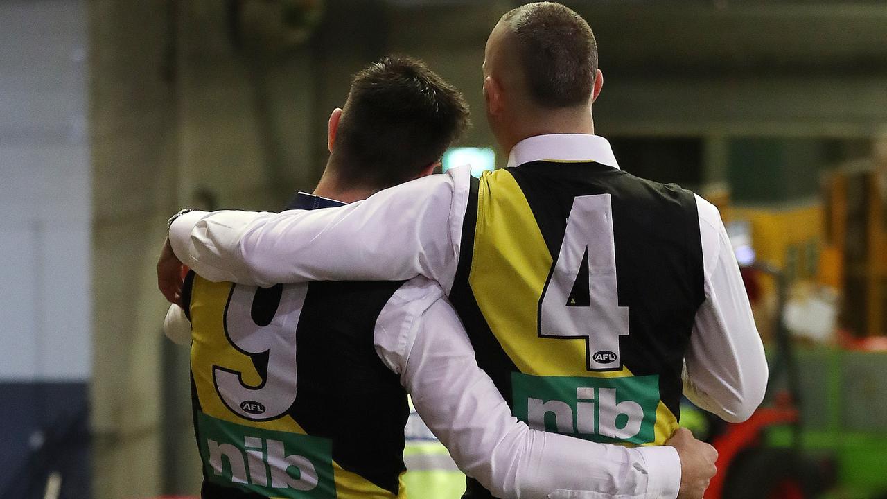 A moment to soak it all in — Dustin Martin and Trent Cotchin. Picture: Michael Klein