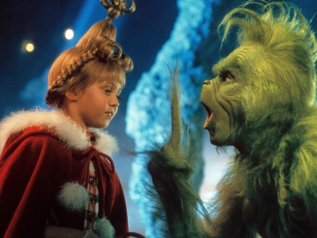 Taylor Momsen and Jim Carrey in a scene from the movie How The Grinch Stole Christmas. Supplied by DreamWorks.