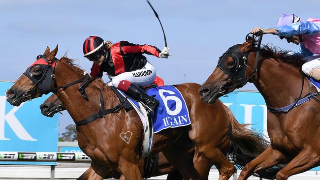 Tegan Harrison rides Dreams Aplenty (left) to victory in  Race 4, the 1400m XXXX Gold Coast Cup at the Aquis Gold Coast Turf Club on the Gold Coast, Saturday, May 5, 2018. (AAP Image/Dave Hunt) NO ARCHIVING, EDITORIAL USE ONLY