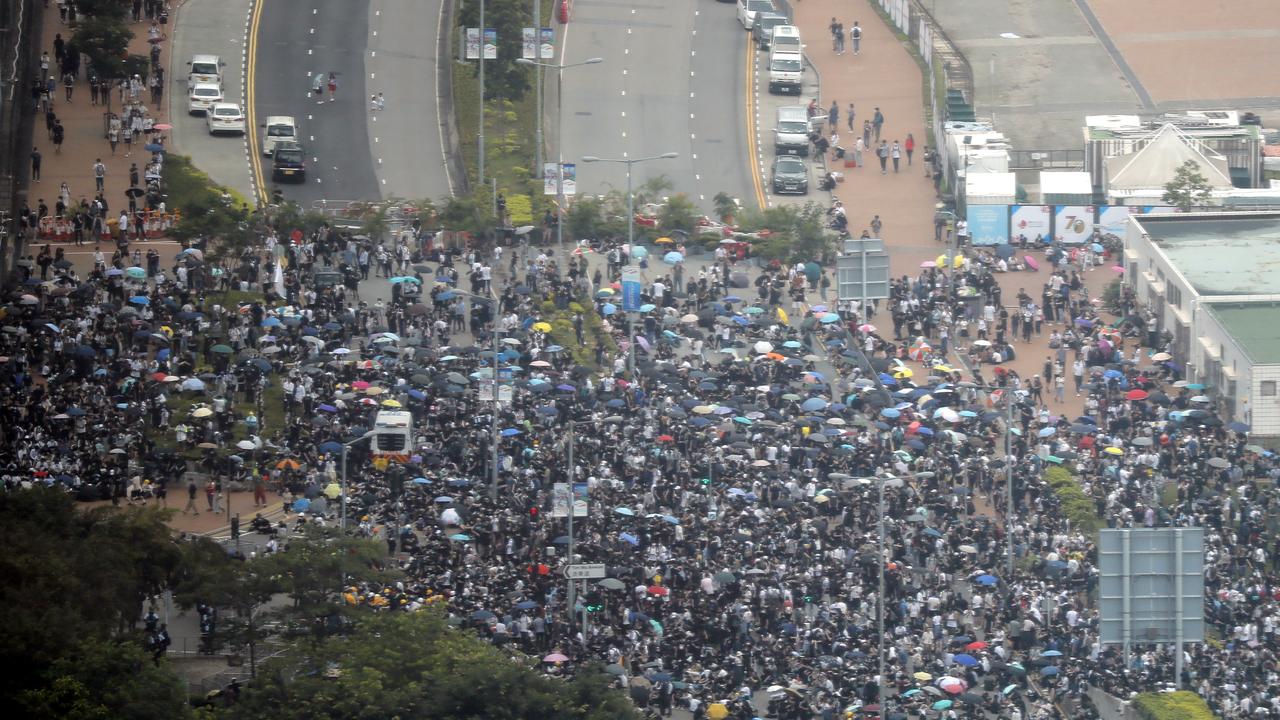 Protesters gather near the Legislative Council. Picture: Kin Cheung/AP