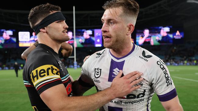 SYDNEY, AUSTRALIA - SEPTEMBER 22:  Cameron Munster of the Storm and Nathan Cleary of the Panthers embrace following the NRL Preliminary Final match between the Penrith Panthers and Melbourne Storm at Accor Stadium on September 22, 2023 in Sydney, Australia. (Photo by Matt King/Getty Images)