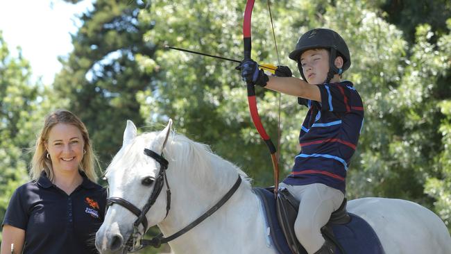 The Australian Pony Club association has 20,000 riders throughout Australia, and about 85% of these are female and 15% male, so they’re crying out for boys. Former top jockey, Clare Lindop with Onkaparinga Pony Club member Jett Donoghue, 10 on his pony Lulu. Picture Dean Martin