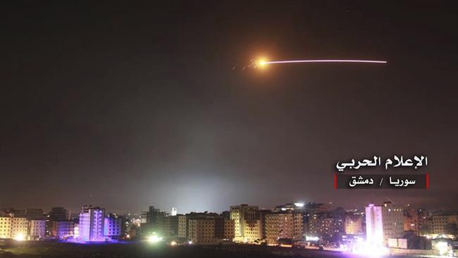 Israeli missiles hit air defence positions and other military bases, in Damascus. Picture: Syrian Central Military Media, via AP.