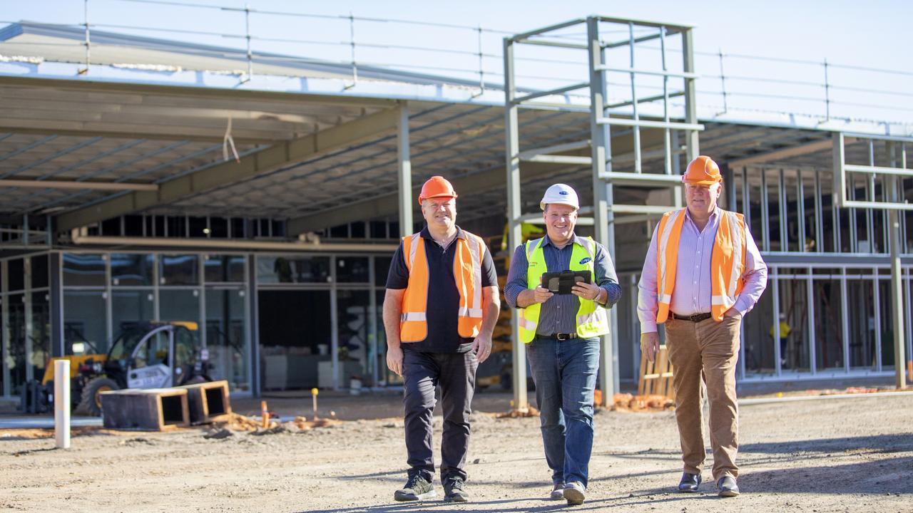 Michael White, Barry Lehmann and Tony Riddle at the new the Forest Glen Village Centre project.