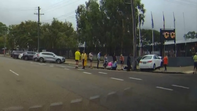 Members of the public rushed to help two teens involved in crash in front of Heatley State High School. Picture: Supplied.