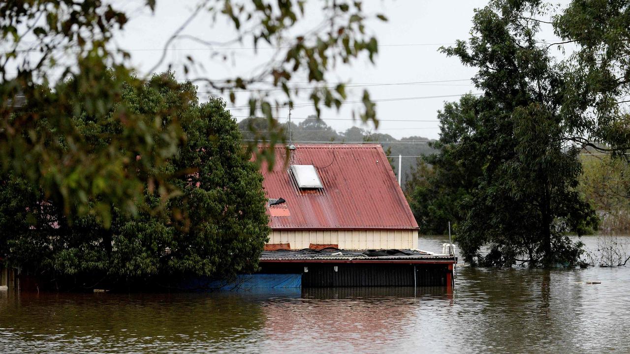 A flooded house near the Hawkesbury River back in July. Photo: Muhammad Farooq / AFP
