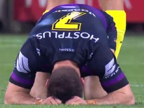 Cooper Cronk stays down after a hit from Adam Blair.