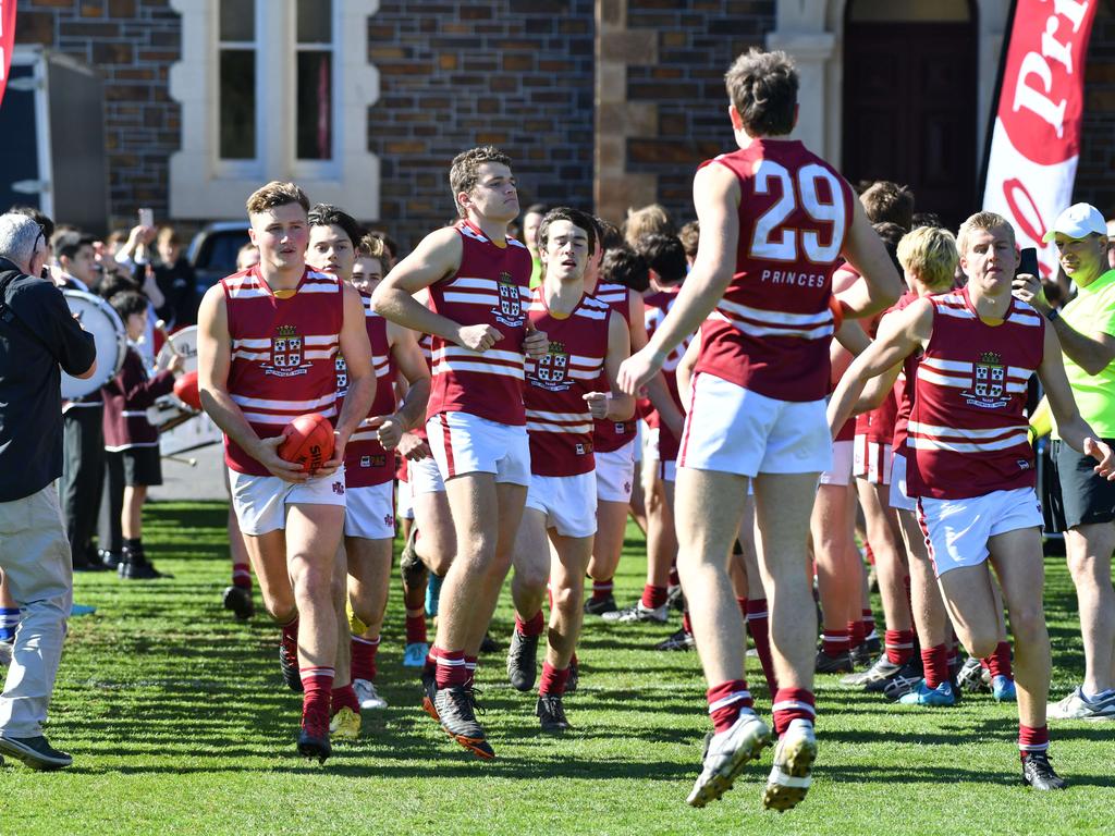 Prince Alfred players running out ahead of their intercol clash with St Peter’s. Picture: AAP/ Keryn Stevens.