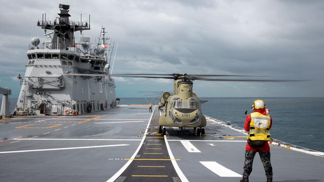 An Australian Army CH-47F Chinook helicopter prepares to take off from the flight deck of HMAS Adelaide during Operation Tonga Assist 2022. Picture: CPL Robert Whitmore