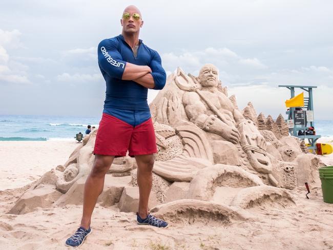 Despite Dwayne Johnson’s best efforts the film remake of the TV series Baywatch becomes increasingly difficult to watch. Picture: Frank Masi