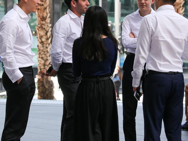 SYDNEY, AUSTRALIA - NewsWire Photos, NOVEMBER 16 2021:  Sydney siders wearing suits are seen getting coffee during lunch hour in the CBD, in Sydney. Picture: NCA Newswire / Gaye Gerard