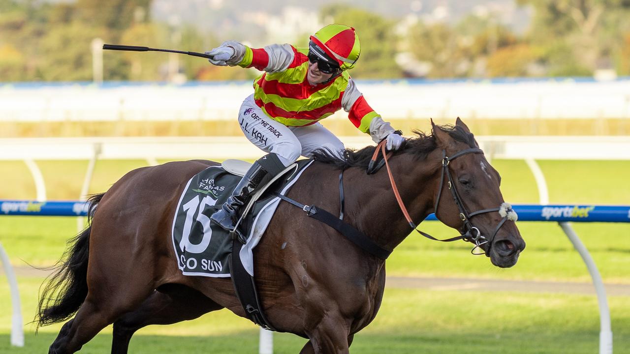 Jamie Kah salutes aboard Coco Sun in the Group 1 SA Derby at Morphettville. Picture: Makoto Kaneko