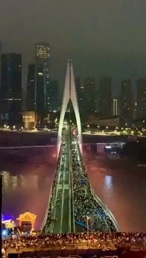 Tourists Crowd Bridge in Chongqing as China Celebrates Week-Long Holiday