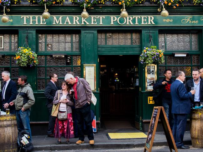 ESCAPE: UK Drink, Mikaella Clements -  London, UK  - April 08, 2015: People traditionally drink beer near the pub after a working day . Picture: iStock